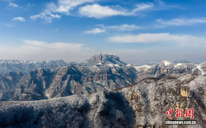 Хэбейдің Уань қаласы: Тайхан тауындағы көктемгі қар және аққулар